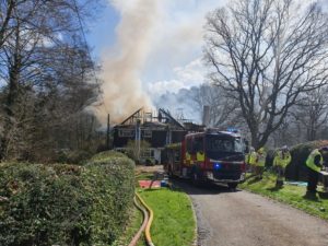 Firefighters from two services work together to tackle Hampshire house fire