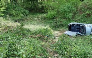 Firefighters rescue casualty from car that had rolled into a ditch in Alton